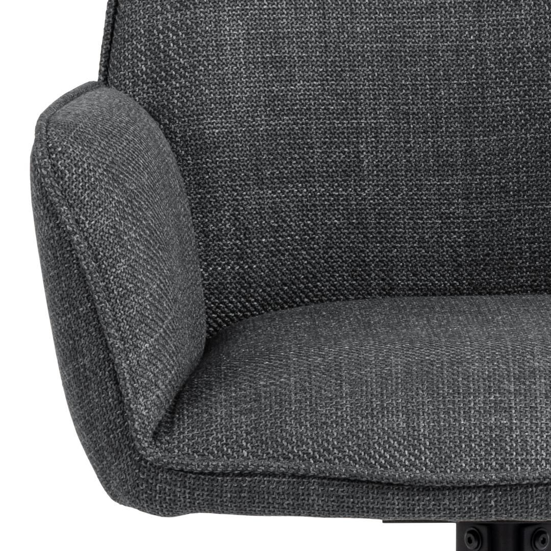 Glenda eetkamerstoel met armleuning: close-up van de grijze stoffen bekleding.