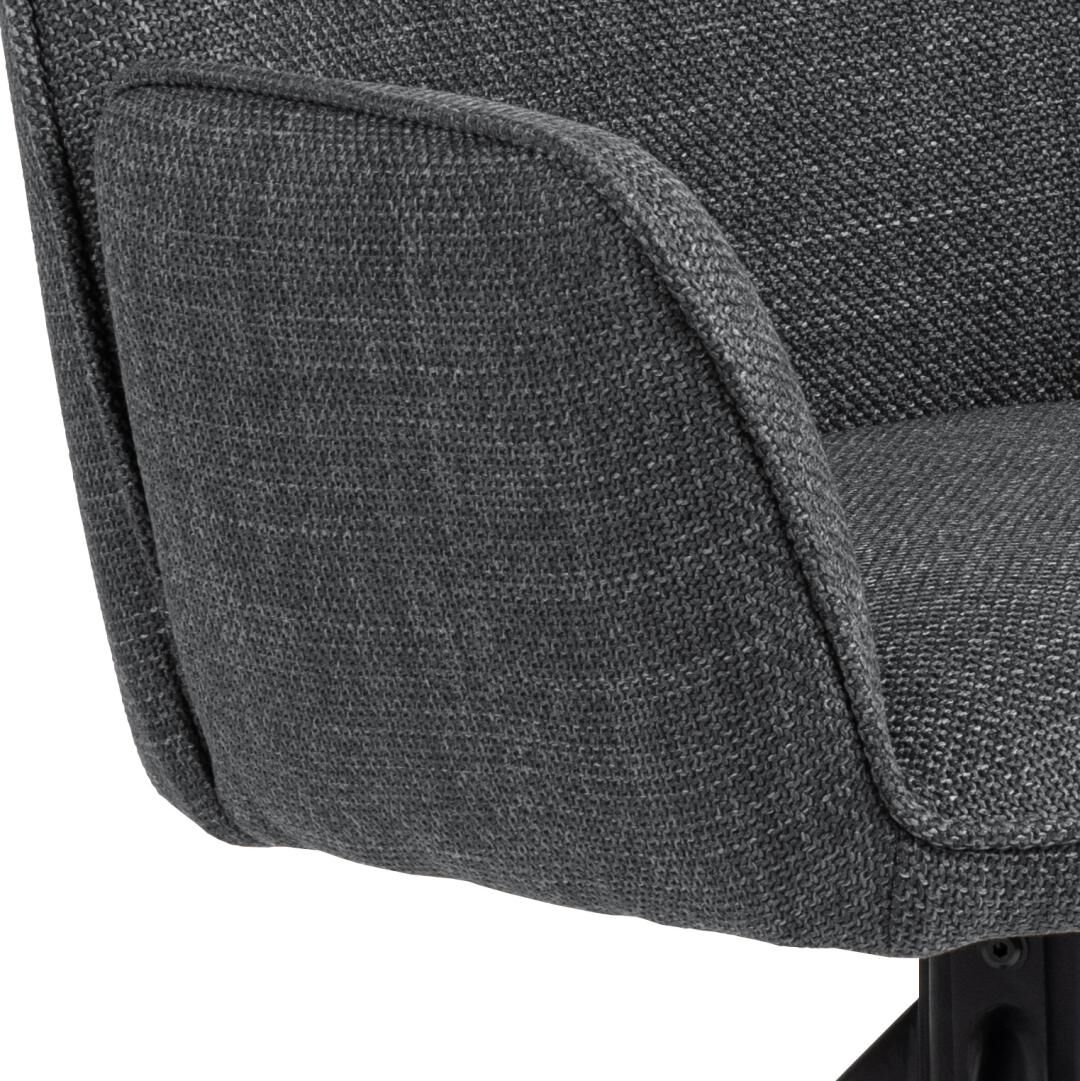 Detailopname Glenda eetkamerstoel: grijze stoffen bekleding armleuning en zitting.