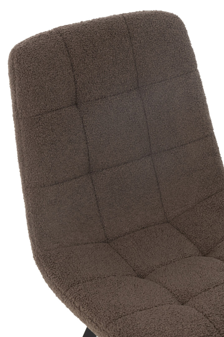 Stoel Laga Eikenhout Zwart: Bruine stoel met teddy stof en vierkant patroon op de rugleuning.