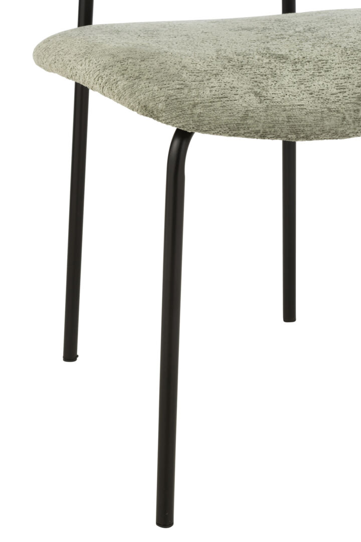 Eetkamerstoel Metaal Stof Mintgroen: close-up van de zitting en zwarte metalen poten.