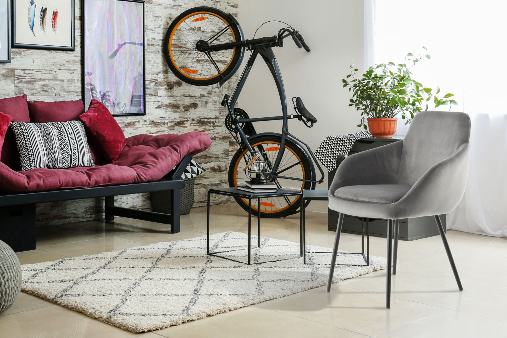 Stoel Cobain 800 Grijs: Grijze velvet stoel in een stijlvolle woonkamer met zwarte salontafel en daybed.