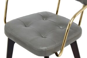 Stoel Manchester Antraciet | Nieuwe Sfeer: grijze, gecapitonneerde zitting met gouden frame.