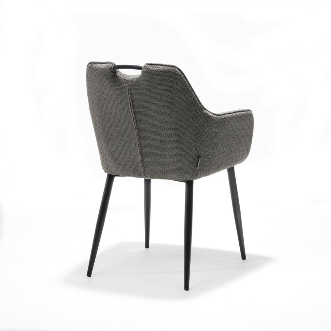 Eetkamerstoel Adele Antraciet Retro Bliss: grijze gestoffeerde stoel met zwarte poten, achteraanzicht.