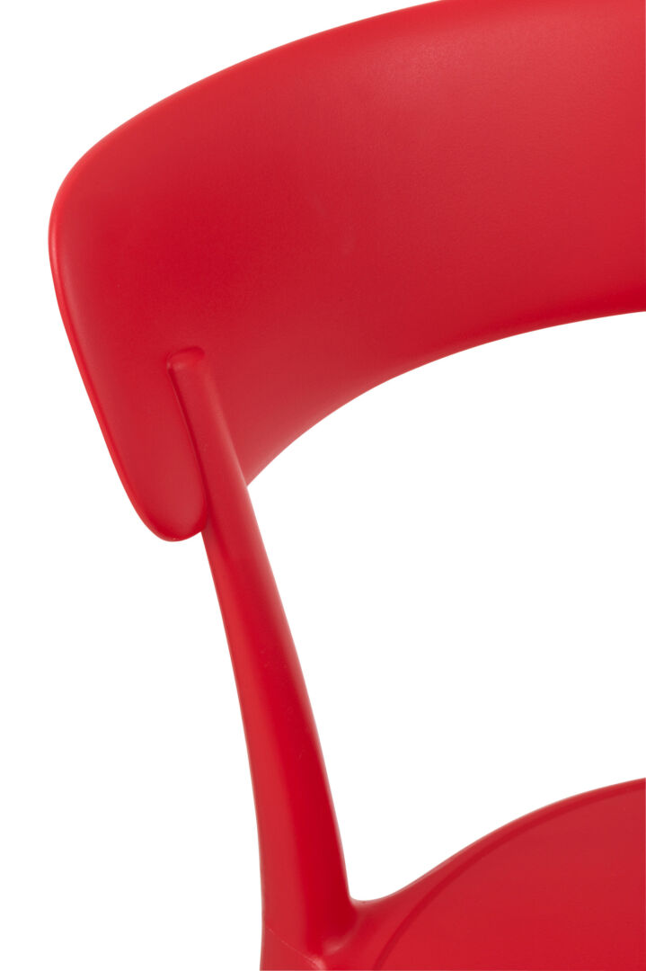 Kurt Eetkamerstoel Polypropyleen Rood: Detail van de rode stoelrug met een gebogen ontwerp.