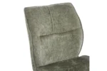 Eetkamerstoel Faye Groen Stof: Detail van de groene stoffen rugleuning.
