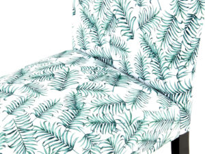Stoel Indira Bloem Design: Stoel met groene bladprint tegen een witte achtergrond voor een frisse sfeer.