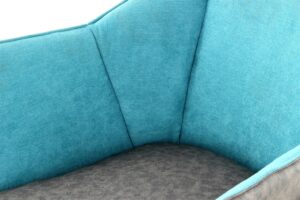 Stoel Marietta 100 Petrol Antraciet Kunstleer detail: blauwe en antraciet zitting.