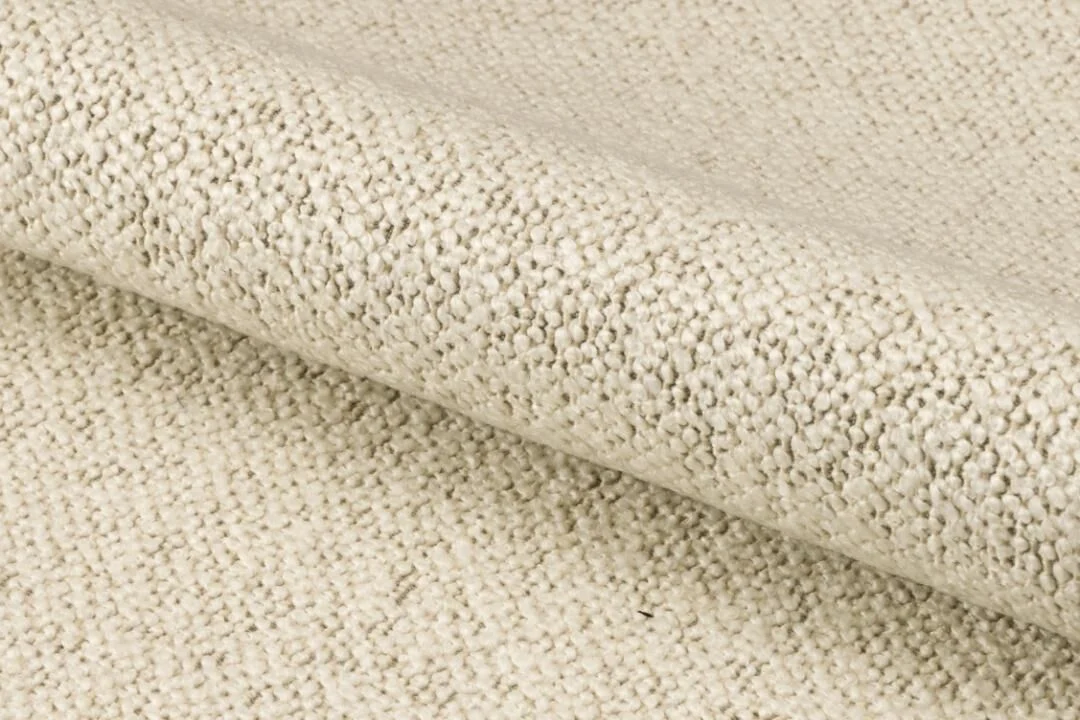 Batilda -A1 eetkamerstoel stof: close-up van de beige stoftextuur.