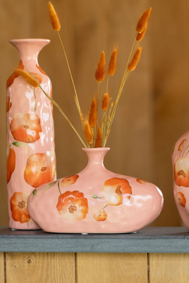 Droogbloemen Pruki Oranje in glazen vaas, luchtige siergrassen met warme oranje tinten en natuurlijke textuur