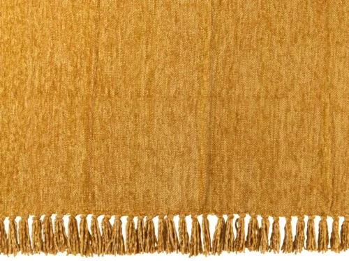 Deken Caurdi Geel in okergeel met zachte textuur en speelse franjes, 170 x 130 cm uit Winter 2025