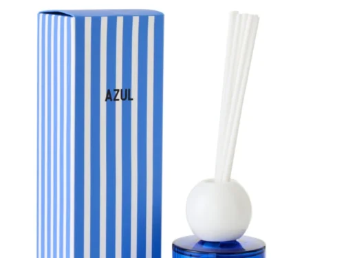 Geurstokjes Faunsas Blauw in blauwe fles met witte stokjes en gestreepte verpakking, stijlvol en fris