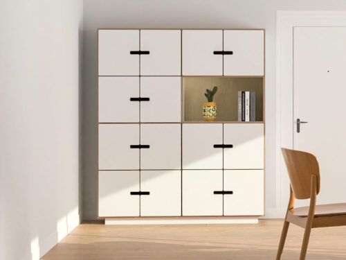 Dressoir Premmor Wit 145 cm met 12 vakken, open nis en strakke zwarte grepen in een rustige woonruimte