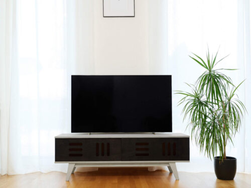 TV-meubel Kaaldund Zwart 120 cm met schuifdeuren, strak design en opbergruimte in modern interieur