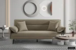 Slaapbank Sievona beige met kussens en slanke poten in een modern interieur