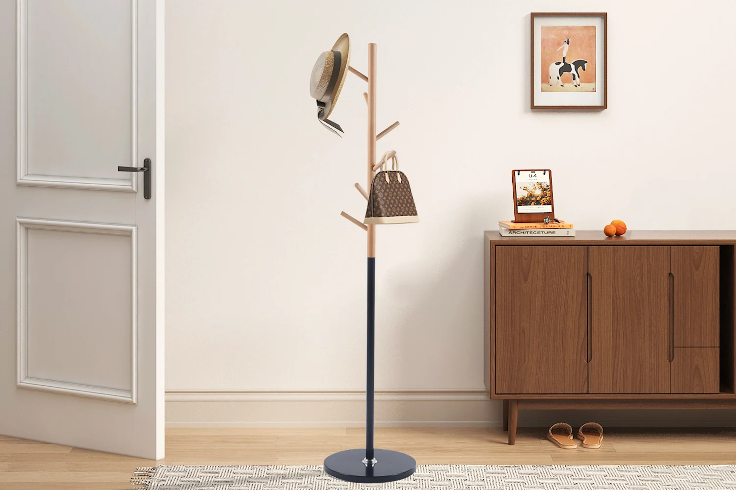 Kapstok Ceikesta Mat Zwart 37 cm met slank design, haken en ronde voet in een rustige hal