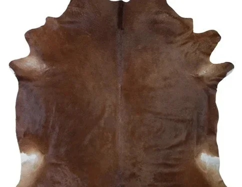 Koeienhuid Rientora Naturel 200x180 cm, bruin vloerkleed met unieke vorm en warme landelijke uitstraling