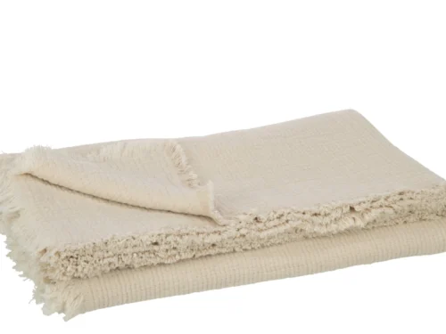 Plaid Zoones Beige van katoen met muslin-structuur en franjes, zacht beige opgevouwen in beeld