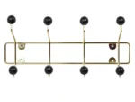 Spot Flooke Zwart kapstok met goudkleurig frame en zwarte bollen, modern en ruimtebesparend