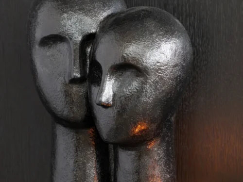 Beeld Gatello steen zwart: twee abstracte gezichten met glanzende afwerking, stijlvol decoratief woonaccessoire