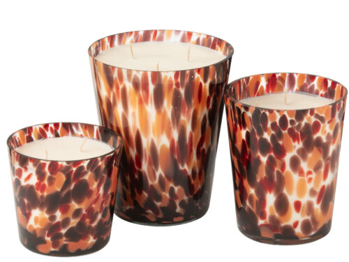 Geurkaars Nienny sojawas meerkleurig in glas, drie decoratieve formaten met warme roodbruine tinten