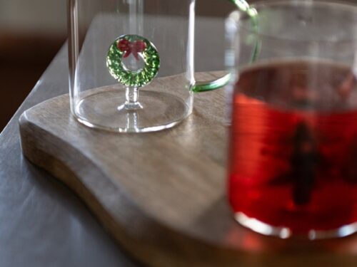 Kerstdecoratie Bromin van transparant glas met groene handgreep en feestelijk kerstmotief