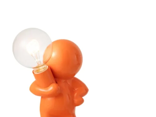 Oranje tafellamp Marcel H30,5 cm met speels figuur en transparante bolvormige kap
