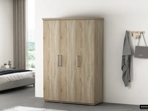 Kledingkast Stiestane 120 cm in licht hout met dubbele deuren en strakke handgrepen in een rustige slaapkamer
