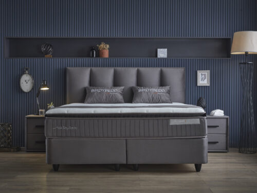 Boxspring Haurdora Antraciet 140x200 met fluwelen bekleding, strak hoofdbord en comfortabele uitstraling