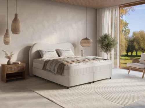 Boxspring Jaullek Gebroken Wit 180x200 met hoofdbord en topdekmatras in rustige slaapkamerstijl