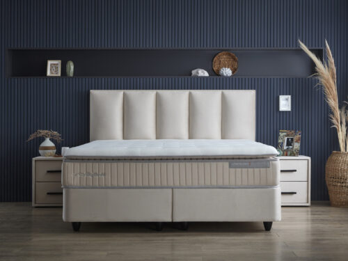Boxspring Briemmi beige 160x200 met gestoffeerd hoofdbord, matras en rustige luxe uitstraling