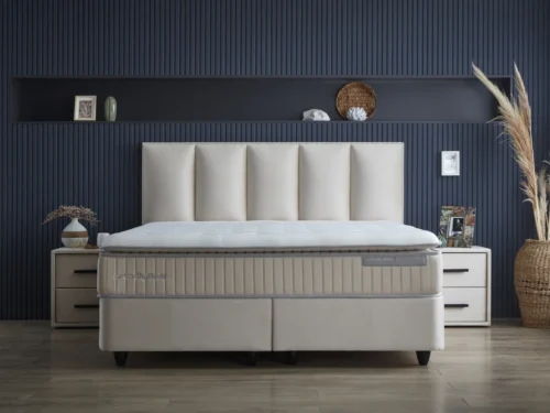Boxspring Briemmi beige 160x200 met gestoffeerd hoofdbord, matras en rustige luxe uitstraling
