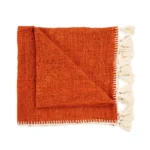 Bedsprei Gossesta terracotta van katoen met grove structuur en witte franjes