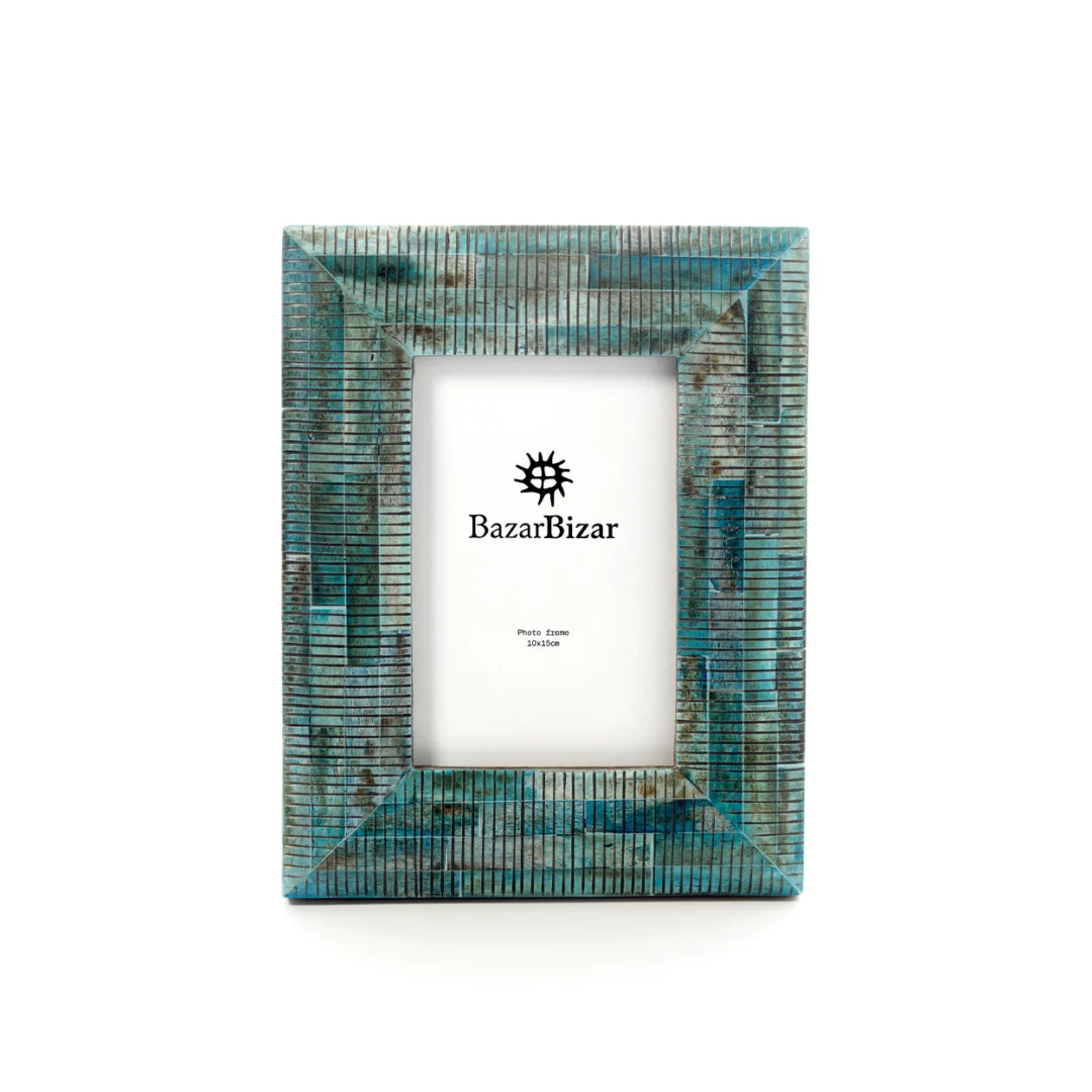 Fotolijst Leistum Turquoise met golvende buffelbot textuur in turquoise, geschikt voor 10x15 cm foto