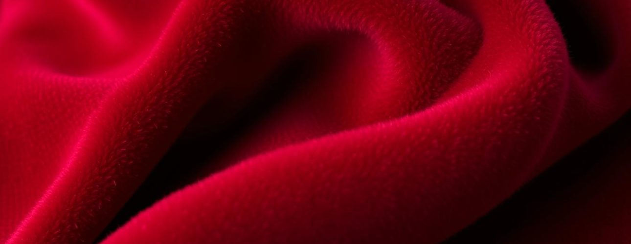 Luxueuze velvet kleur stof met rijke textuur en diepe gloed